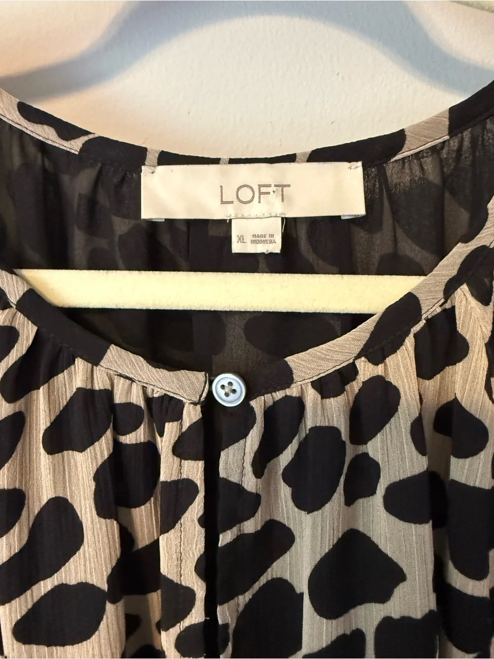 LOFT Black and Beige Animal Print Peplum Tunic